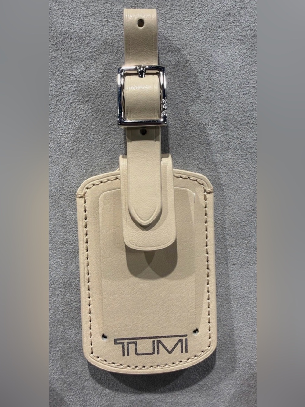 NEW IN BOX - Tumi 3.625” x 2.25” Leather Luggage Name Tag w/ Buckle - BEIGE